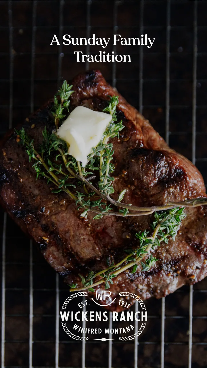 Steak with herb butter on the grill under the Sunday family tradition line
